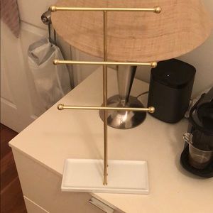 Jewelry hanger. Gold and white